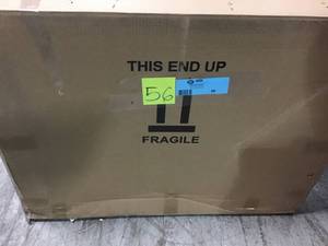 lot 56 image: 31 in. W x 19 in. D Cultured Marble Vanity Top in White on White with White on White Basin &nbspin good condition 