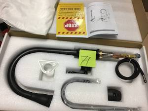 lot 71 image: Easy-Install Single-Handle Pull-Down Sprayer Kitchen Faucet with Flexible Hose in Matte Black by AKDY &nbspin good condition 