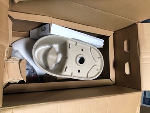 lot 101 image: 2-piece 1.1 GPF1.6 GPF High Efficiency Dual Flush Complete Elongated Toilet in White, Seat Included by Glacier Bay in good conditions