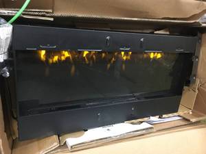 lot 114 image: 42 in. Infrared Wall Mount Electric Fireplace in Black in working conditions missing screws and braket for wallmount
