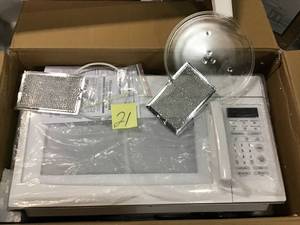 1.6 cu. ft. Over the Range Microwave in White in good condition