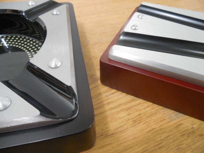 lot 68 image: (2) Iris Metal and Black Matte Wood Cigar Ashtray