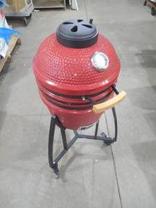 lot 31 image: Kamado 133 sq. in. Cooking Surface Charcoal Grill and Smoker with Locking 4 Wheel Cart and Grill Cover in Red
