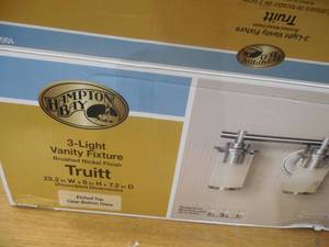 lot 95 image: Truitt 3-Light Brushed Nickel Vanity Light with Clear and Sand Glass Shades