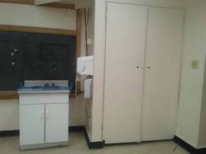 Sink and Cabinet, Closet, Towel and Soap Dispensers