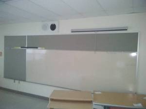 White Board, Bulletin Boards and Projector Screen.