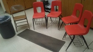 5 chairs, Floor Mat and garbage can.