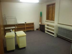 Misc. Hardwood Floor, Carpet, dry storage carts, bookshelves, Radiator And more.