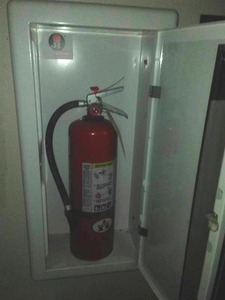 Fire extinguisher & cabinet.