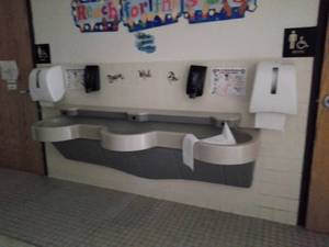 Large communal sink - soap & paper Towel dispensers