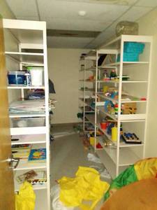 Closet contents - great metal shelving.
