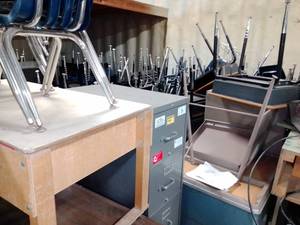 Dozens of metal desks, 2 file cabinets, blue chairs, 2 adult desks and more. Huge Lot