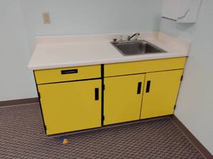 Cabinet, Sink, Countertop and contents.