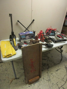 lot 214 image: ASSRTD. AUTOMOTIVE SUPPLIES, HITCHES, BATTERY TESTERCHARGERS, BOTTLE JACKS, CREEPER, MORE