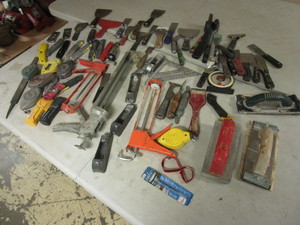 lot 228 image: ASSRTD. DRYWALL SUPPLIES, SCRAPERS, UITLITY BLADES, CHALK LINES, CAULK GUNS, MORE