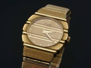 lot 4 image: Sophisticated 18k Piaget Polo Quartz Watch, Round Champagne Dial Not Working