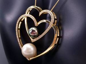 lot 17 image: Fine Lustery Pearl and Diamond Heart Double Pendant in 18k Yellow Gold