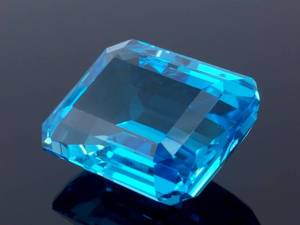 lot 16J image: Very Impressive 36.52 Carat Blue Topaz Emerald Cut