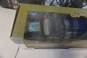 lot 283 image: Outdoor Sportsman Bass Angler Sportsman Society Themed Chevy Suburban 118 Scale Model Car