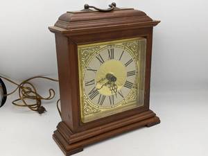 lot 110 image: Pair of Wood Framed Mantel Clocks