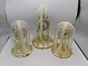 lot 118 image: Trio of Flashy Anniversary Clocks