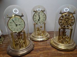 lot 129 image: Three Anniversary Domed Clocks