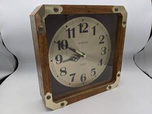 lot 130 image: Watham by Spartus Square Wood Wall Clock