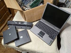 lot 79 image: Dell Latitude Laptop with Accessories