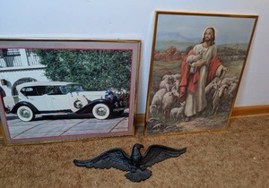lot 86 image: (3) Wall Hangings 1931 Cadillac, Jesus, Eagle