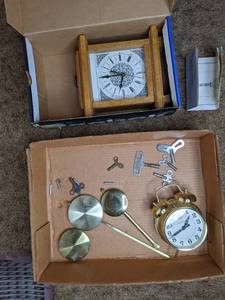 lot 94 image: Two Clocks plus Keys and Pendulums