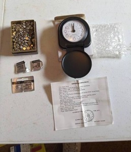 lot 29 image: Travel Clock and a Multitude of Watch Batteries