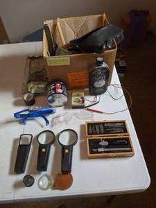 lot 31 image: Box Full of Jewelry Repair Tools and Cleaners