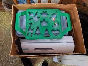 lot 293 image: Wraptastic Food Wrap Dispenser and Cookie Making Supplies