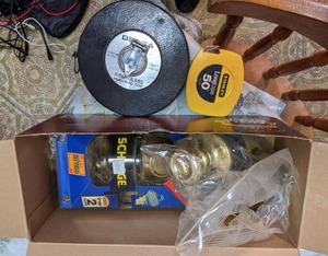 lot 298 image: (2) Measuring Tapes and Door HandleLock Sets