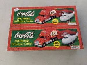 lot 384 image: (2) NIB Coca-Cola Holiday Helicopter Carrier Trucks