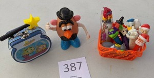 lot 387 image: Assorted Pez Dispensers, Mini Mr. Potatohead and Odd Parents Tin