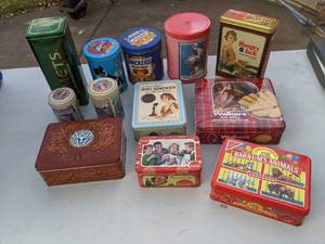 lot 399 image: A Dozen Assorted Tins