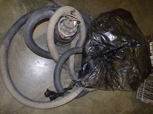 lot 7 image: Sump Pump with hose