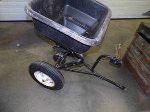 lot 16 image: Pull Behind Fertilizer Spreader for Garden Tractor