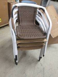 4 Rattan Stack Chairs...