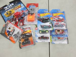 6 Hot Wheels Cars plus misc small v...