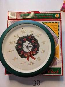 lot 30 image: Musical Christmas Carol Wall Clock