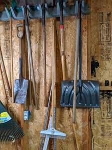 lot 182 image: Tool Holder with Shovels and Rakes