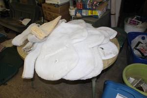 lot 18 image: Lot of (9) Horse Tack and Gear - Fleece Saddle Pads (x4), Fleece Saddle Girth Belt Pads (x5)