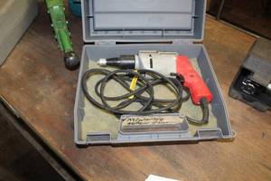 lot 122 image: Milwaukee Heavy Duty Screw Shooter 5758-1, Case