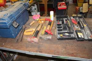 lot 125 image: Rubbermaid Plastic Tool Box with Tool Caddy, Sledgehammer, Hammers, Hand Saws, and more