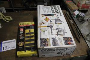 lot 153 image: 1000W Twin Head Halogen Worklight (new in box), Stanley Contractor Grade Pro Strip Power Strip 8-Outlet 10 (new in box)