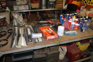 lot 203 image: Oil Filter Strap Wrenches, Windshield Wiper Blade Replacements, Fram Air Filter, Misc. Automotive Parts and Chemicals