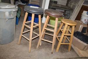 lot 335 image: Lot of (3) Wood Bar Stools - Unpadded (x1), Padded (x2)