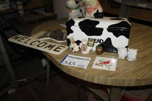 lot 345 image: Lot of (8) Home Dcor - Pig Toothpick Holder, Bread Box, Owl Salt & Pepper Shakers, Cow Welcome Sign, Cardinal Table Coaster, and more